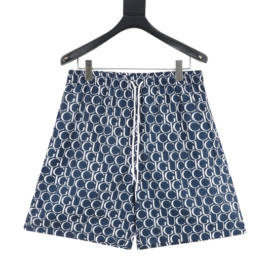 Gucci All-Over Graphic Print Shorts front view